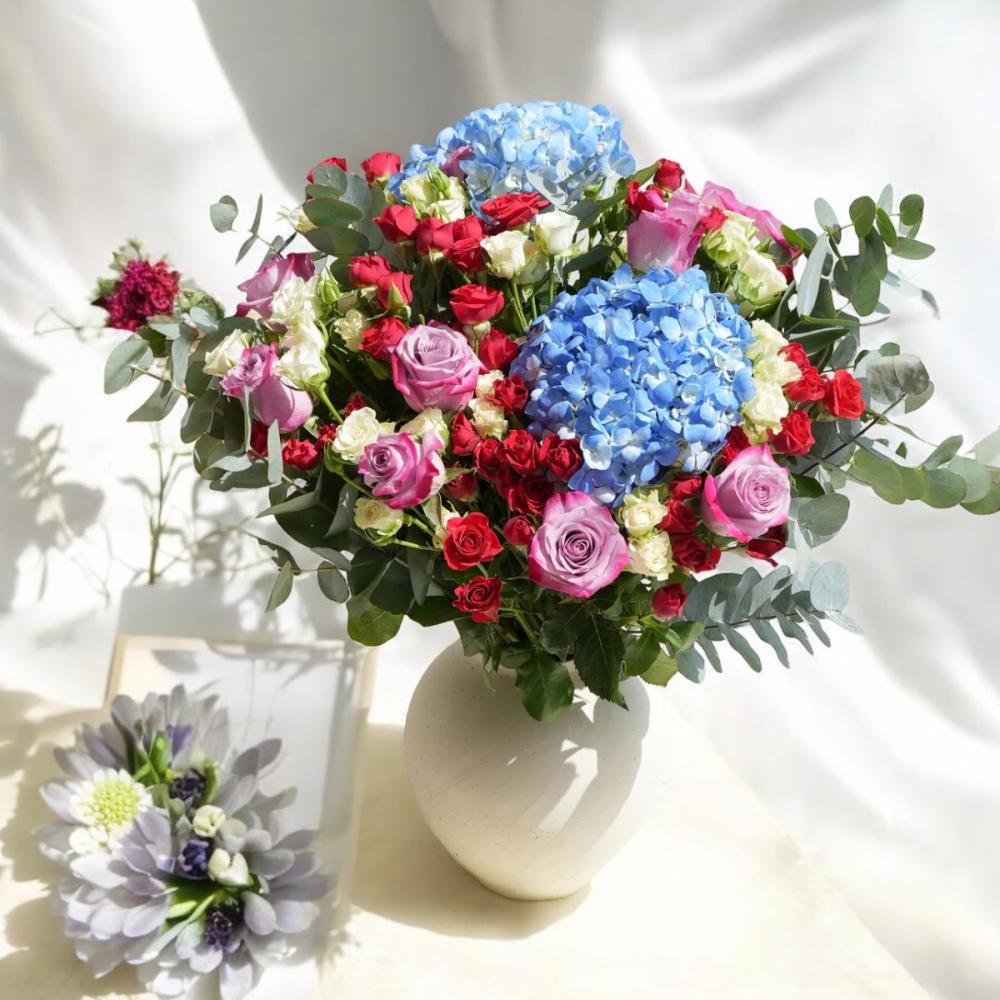 زهور الربيع الملونة Flowery فلاوري.