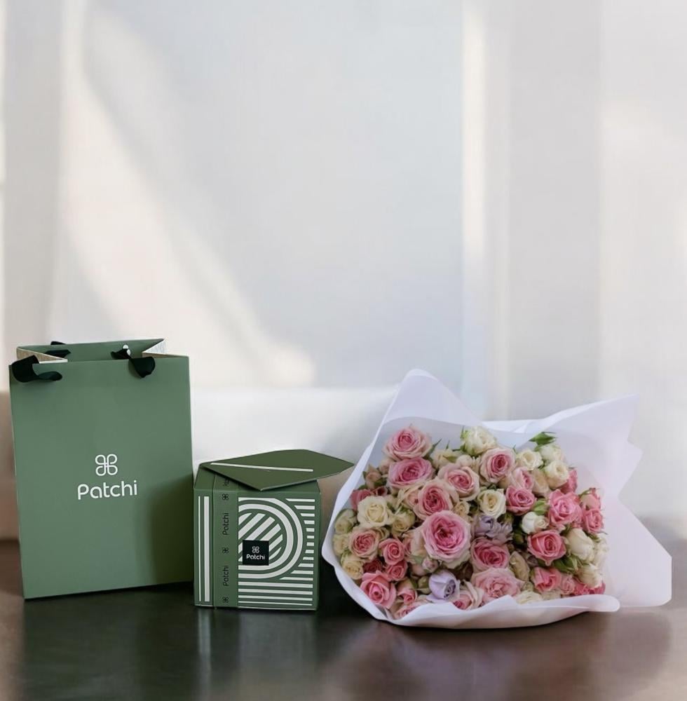 باقة الورد الوردي الرومانسية مع شوكولاتة باتشي الفاخرة Flowery فلاوري.