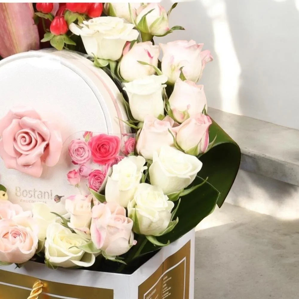 باقة الورد الفاخرة مع شوكولاتة بستاني Flowery فلاوري.