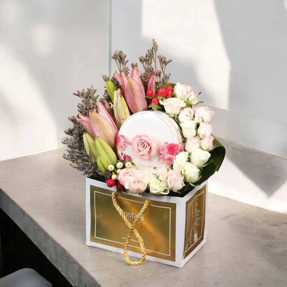 باقة الورد الفاخرة مع شوكولاتة بستاني Flowery فلاوري.