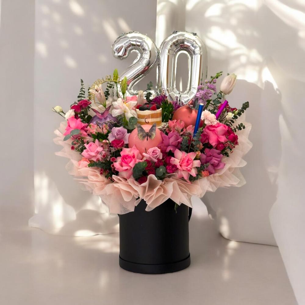 باقة الاحتفال بعيد الميلاد Flowery فلاوري.