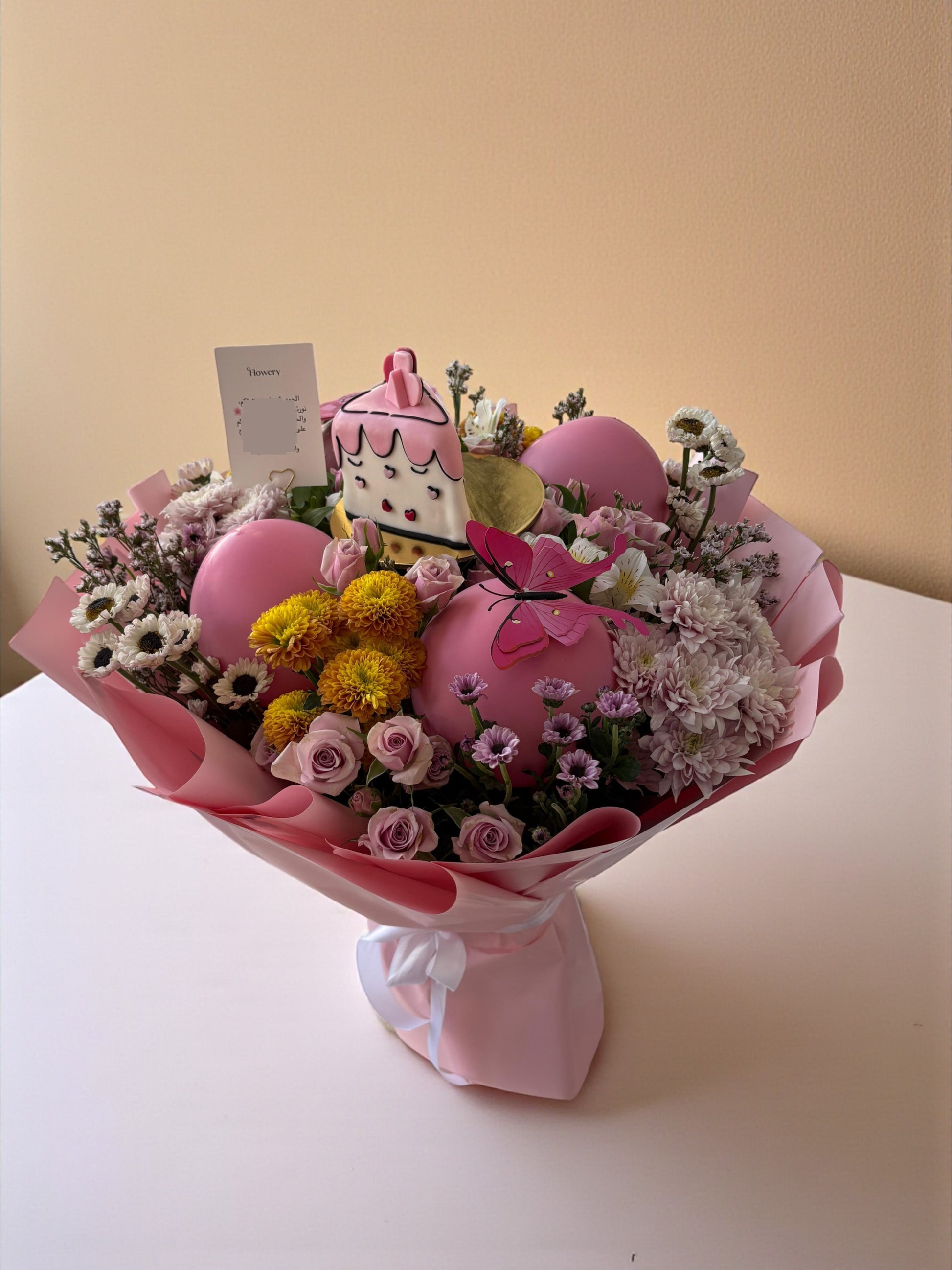 باقة عيد الميلاد Flowery فلاوري.