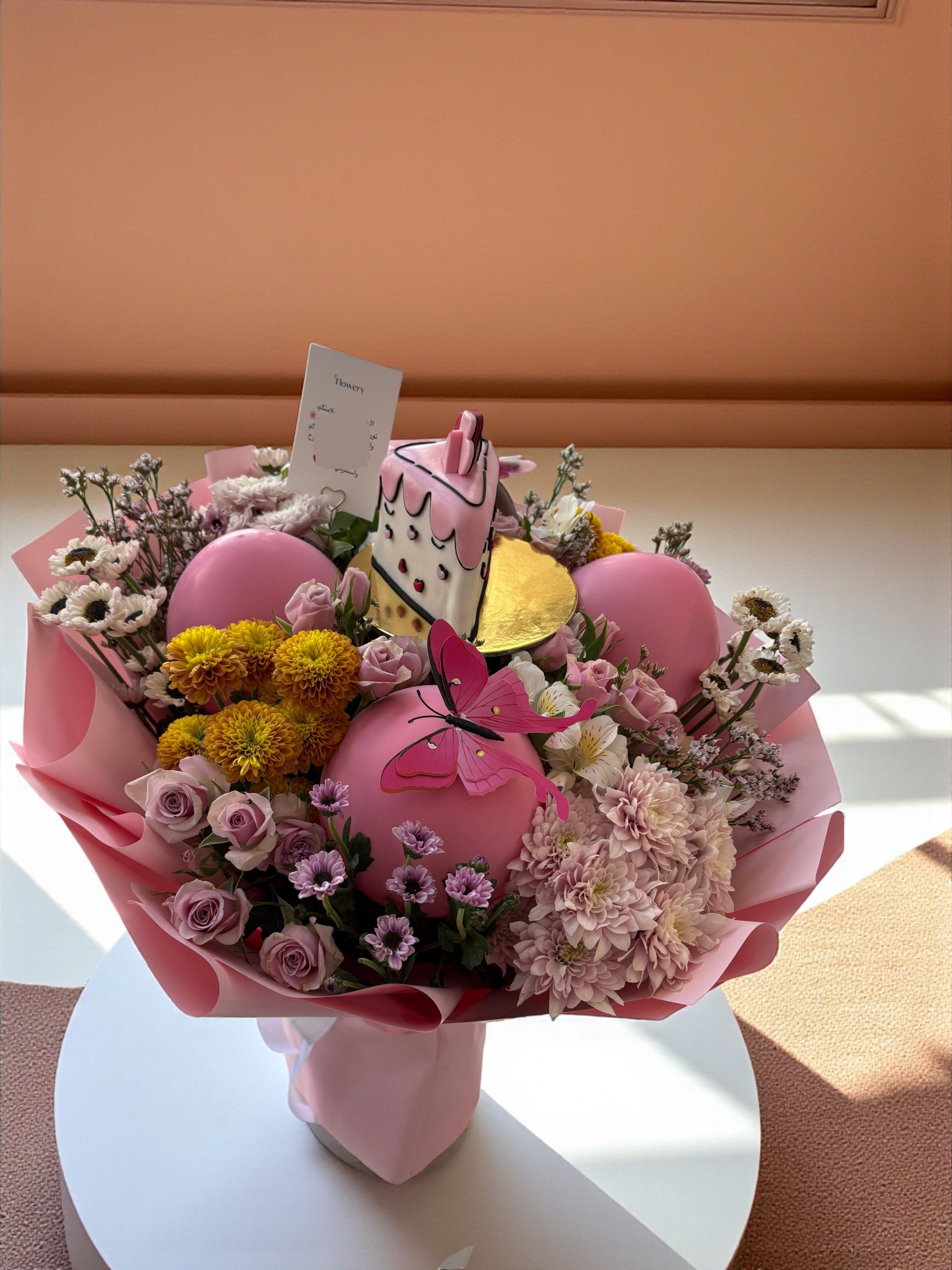 باقة عيد الميلاد Flowery فلاوري.