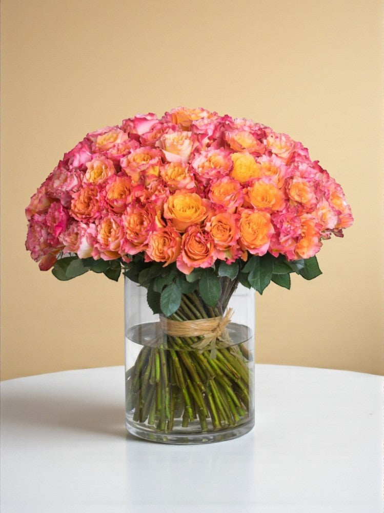 مزهرية جوري برتقالي مشرقة | 100 زهرة Flowery فلاوري.